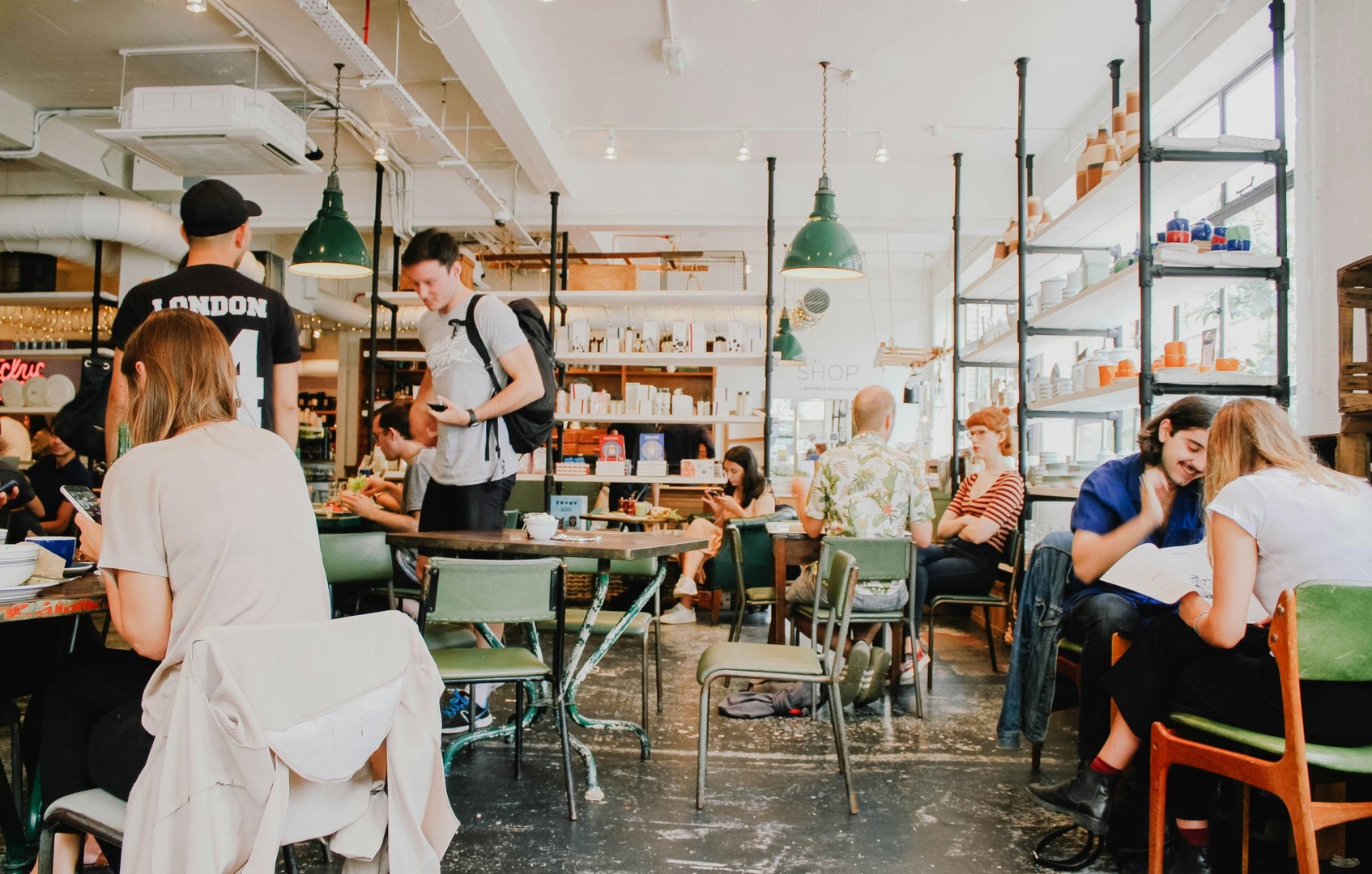 Diners gathered at tables in a restaurant